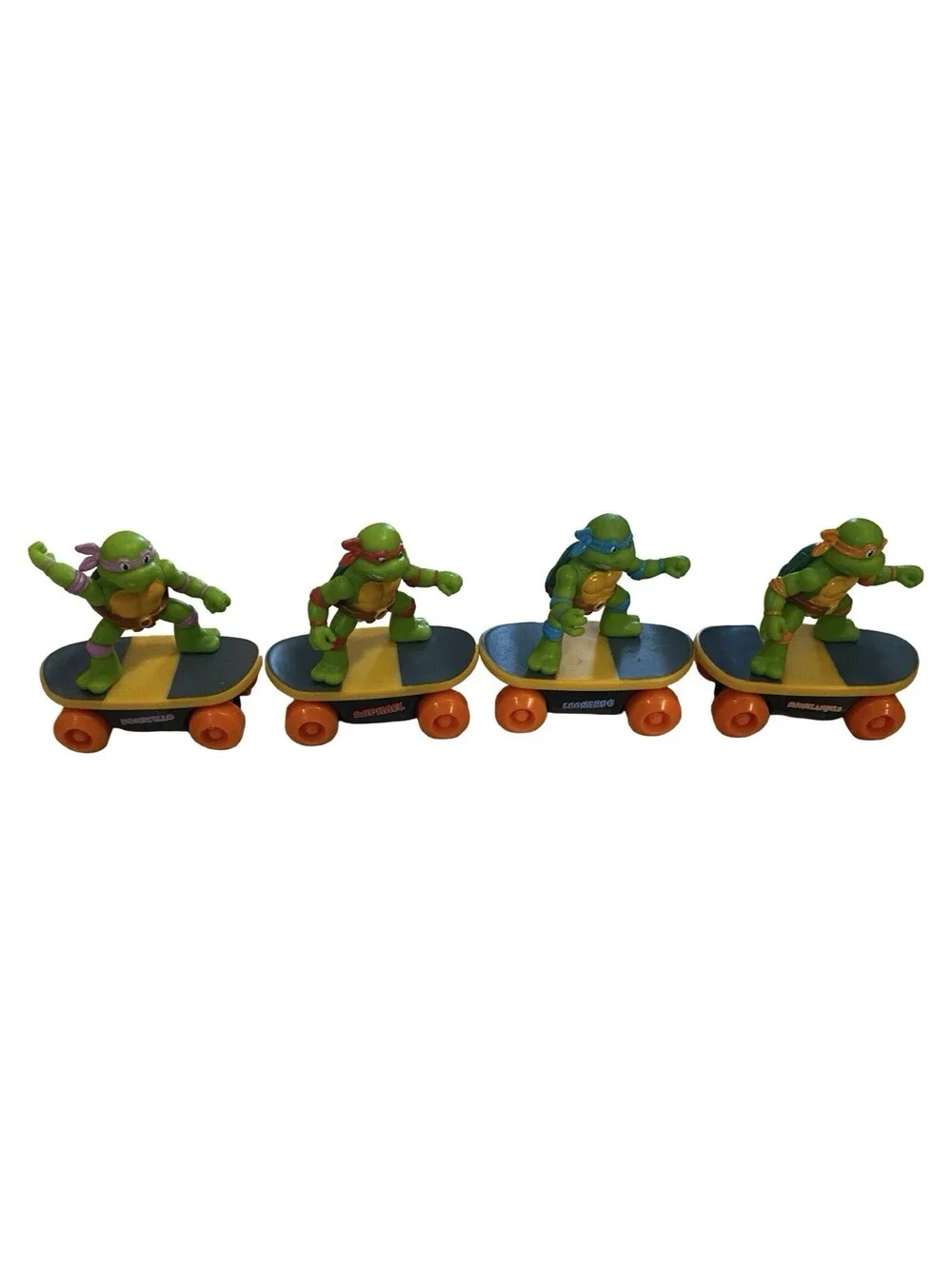 TMNT Teenage Mutant Ninja Turtles Pizza Slice Skateboarding Toys Set of 4